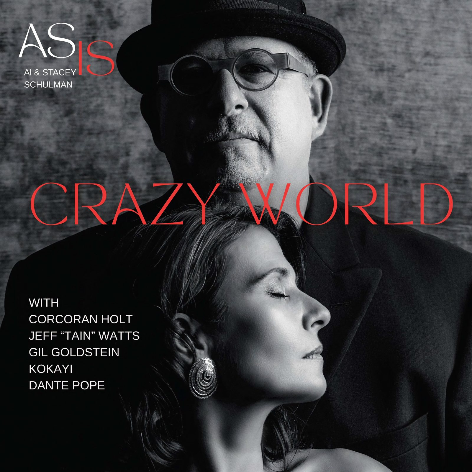 Crazy World album cover: Al and Stacey Schulman in black and white, the title in red